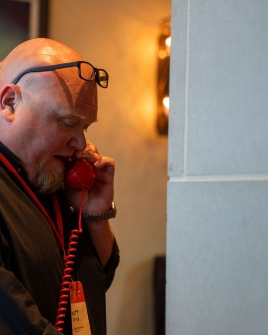 Rep talking on the phone with a customer Rep talking on the phone with a customer