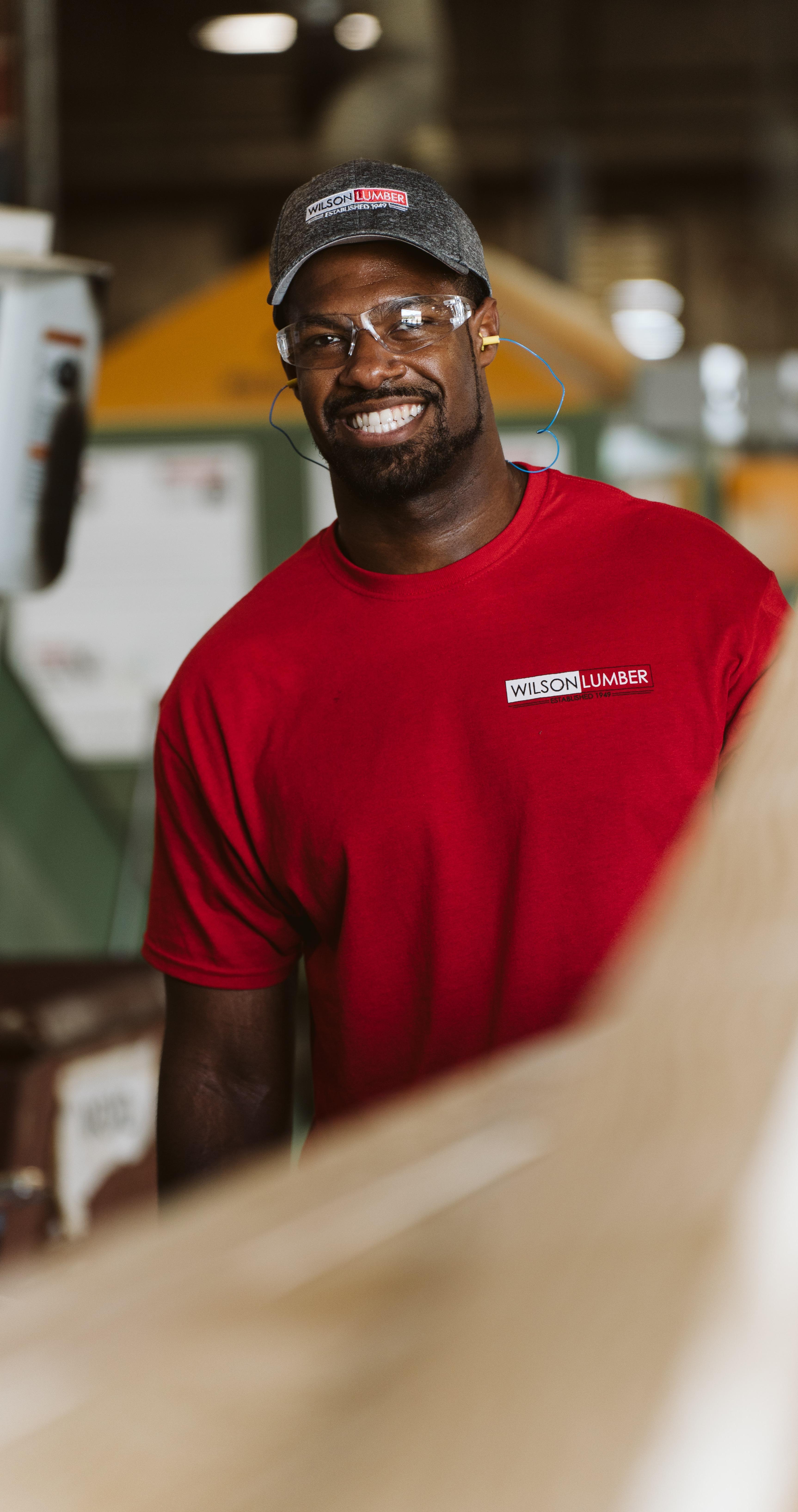 Wilson-Lumber-employee-pulling-lumber